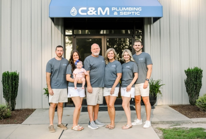 C&m Plumbing Family With Building C&m Plumbing Family With Building